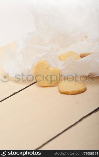 fresh baked heart shaped shortbread valentine day cookies on a paper wrap