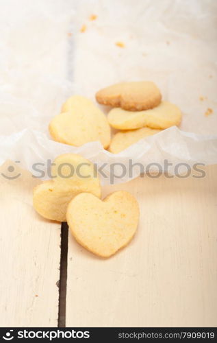 fresh baked heart shaped shortbread valentine day cookies on a paper wrap