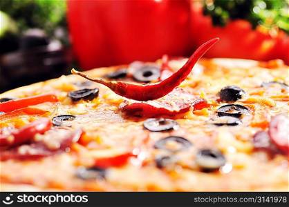 fresh baked pizza with diferent ingredients