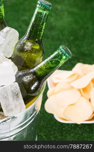 Fresh beer in a cooler with ice