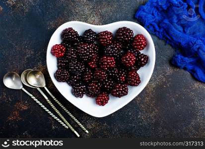 fresh berries, fresh blackberry on white plate