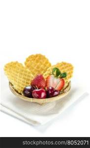 fresh berries fruit and waffles . fresh berries fruit and waffles in bamboo basket