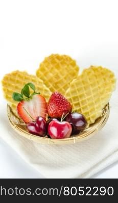 fresh berries fruit and waffles . fresh berries fruit and waffles in bamboo basket