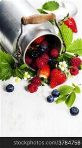 Fresh Berries on Wooden Background. Strawberries, Raspberries and Blueberries. Health, Diet, Gardening, Harvest Concept