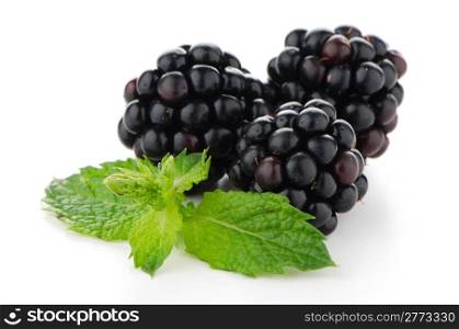 Fresh berry blackberry with green mint leaves isolated on white background.