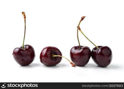 fresh black cherries isolated on white