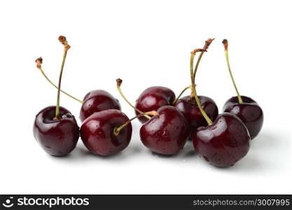 fresh black cherries isolated on white