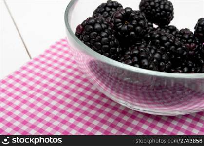 Fresh Blackberries in Glass Bowl on White Table