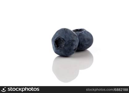 Fresh blueberries isolated on white background - close up