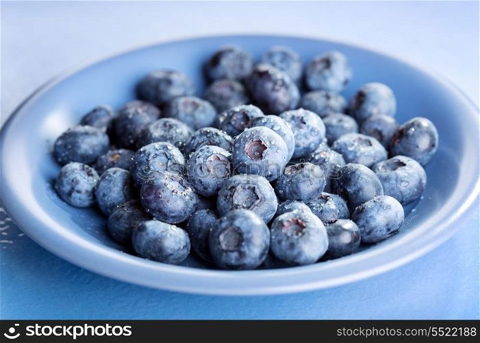 Fresh blueberries on a plate
