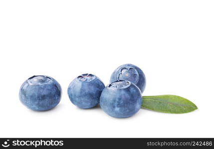 Fresh Blueberries with leaves isolated on white background. Macro shot