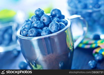 fresh blueberry on a table, blueberry on wooden background