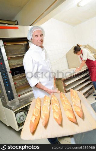 Fresh bread coming out of the oven