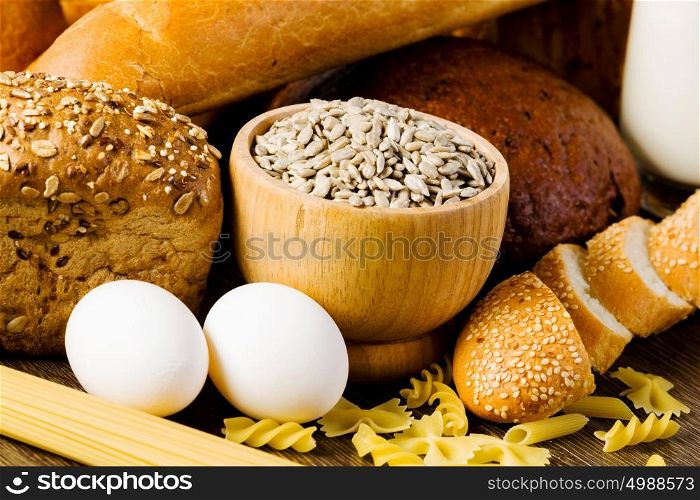Fresh bread. Fresh bread, eggs and macaroni on table