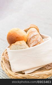 Fresh bread in the basket. Food background.