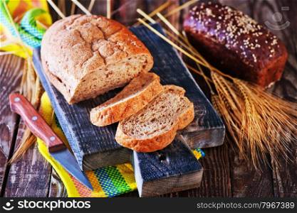 fresh bread on napkin and on a table