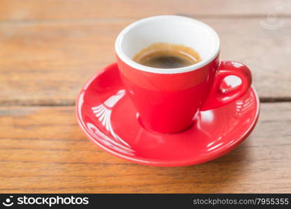 Fresh brewed hot espresso in red cup, stock photo