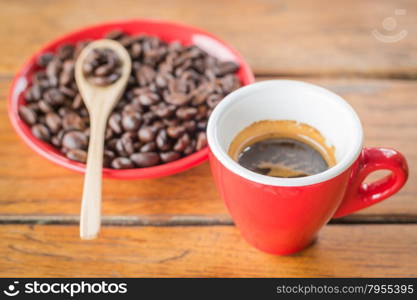 Fresh brewed hot espresso with roasted bean, stock photo