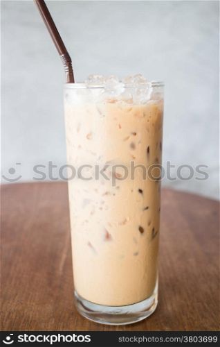 Fresh brewed ice coffee on wooden table, stock photo