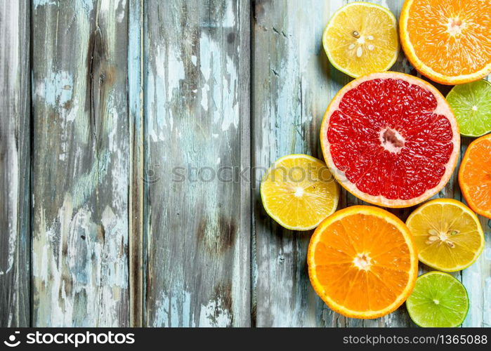 Fresh bright citrus. On white wooden background. Fresh bright citrus.