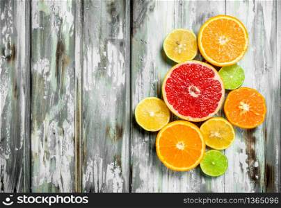 Fresh bright citrus. On white wooden background. Fresh bright citrus.