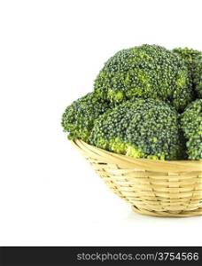 Fresh broccoli. Fresh broccoli in Straw basket on white background.