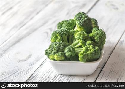 Fresh broccoli on the white bowl