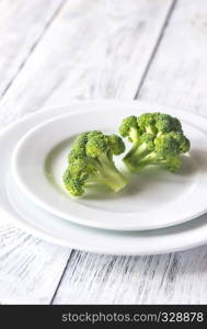 Fresh broccoli on the white plate