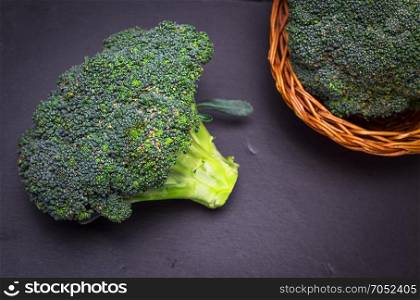 fresh cabbage broccoli on a black background, top view, selective focus