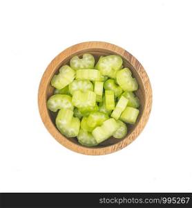 fresh Celery sticks, celery stalk slice in wooden bowl isolated on white background