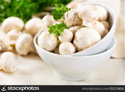 Fresh champignon mushrooms with parsley