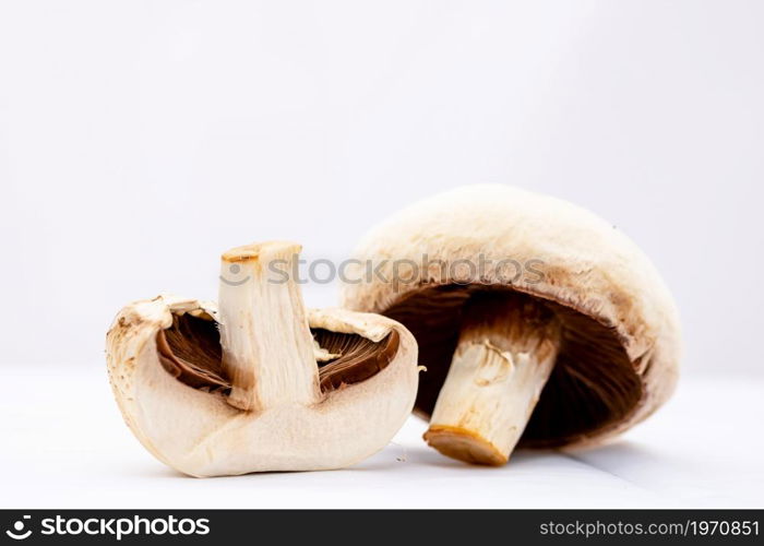 Fresh champignons, champignon mushrooms, close-up, isolated