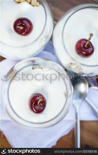 Fresh cherries and vanilla yoghurt breakfast