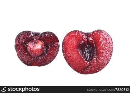 fresh cherry cut in halves isolated on white
