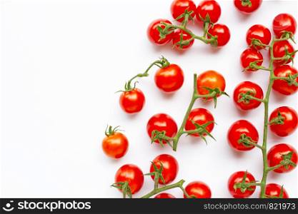 Fresh cherry tomatoes isolated on white background. Copy space