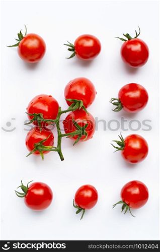 Fresh cherry tomatoes on white background