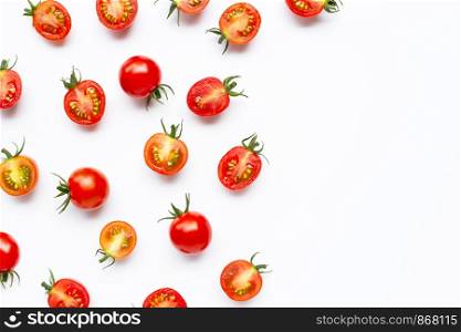 Fresh cherry tomatoes, whole and half cut isolated on white background. Copy space