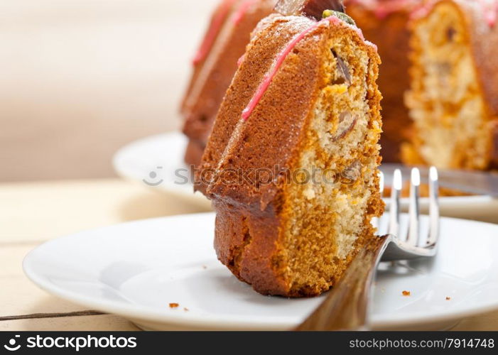 fresh chestnut cake bread dessert with almonds and pistachios on top