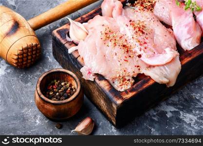Fresh chicken meat with ingredients for cooking.Raw meat.. Chicken steak raw meat