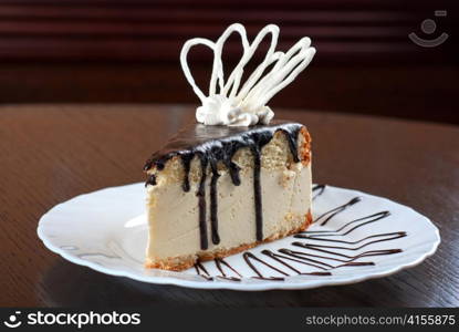 fresh chocolate cupcake closeup on a wooden table