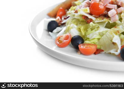 fresh chopped ham salad with cheese on white plate