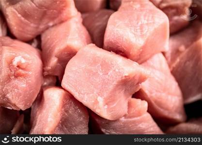 Fresh chopped raw pork. Macro background. High quality photo. Fresh chopped raw pork. Macro background.