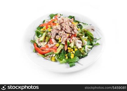 fresh chopped tuna salad with spinach on white plate
