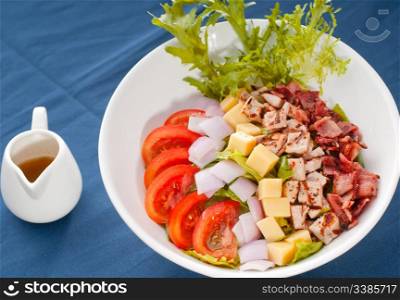 fresh classic caesar salad over blue tablecloth close up,healthy meal ,MORE DELICIOUS FOOD ON PORTFOLIO
