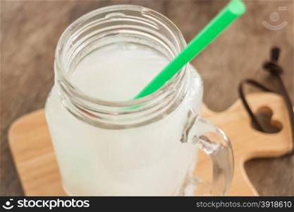 Fresh cold coconut water glass, stock photo