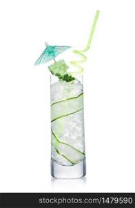 Fresh cold cucumber water in highball glass with ice cubes and cucumber slices with umbrella and straw on white background. Healthy and refreshing organic drink.