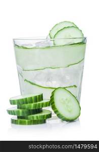 Fresh cold cucumber water with ice cubes and cucumber slices on white background. Healthy and refreshing organic drink.