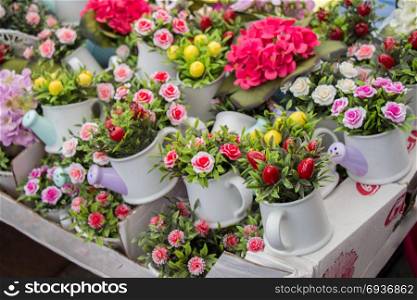 Fresh colorful Flowers put in vases at the florists