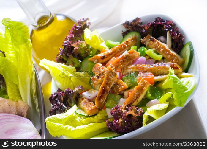 fresh colorfull sesame chicken salad close up