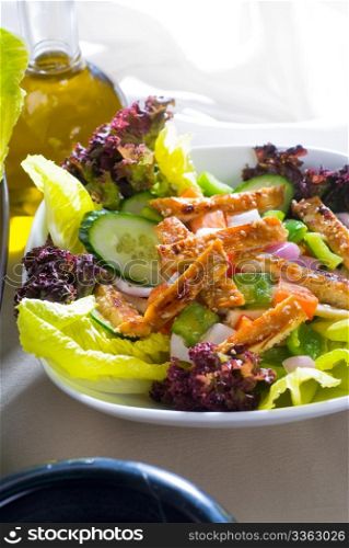 fresh colorfull sesame chicken salad close up
